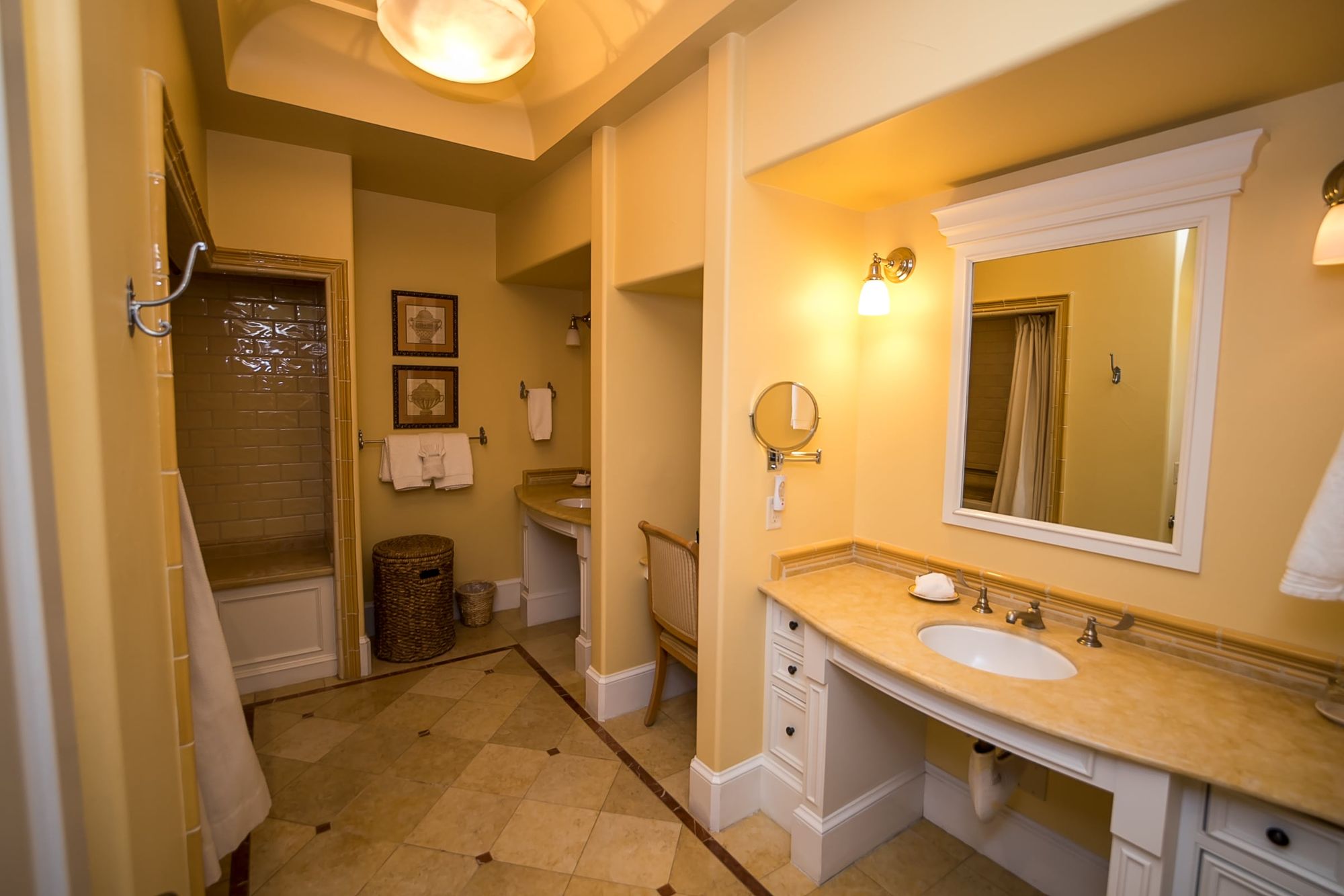 Bathroom with two vanities and tile floors
